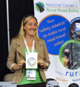 Jaime Sullivan presents information about the National Center for Rural Road Safety at a Conference information booth (2017)