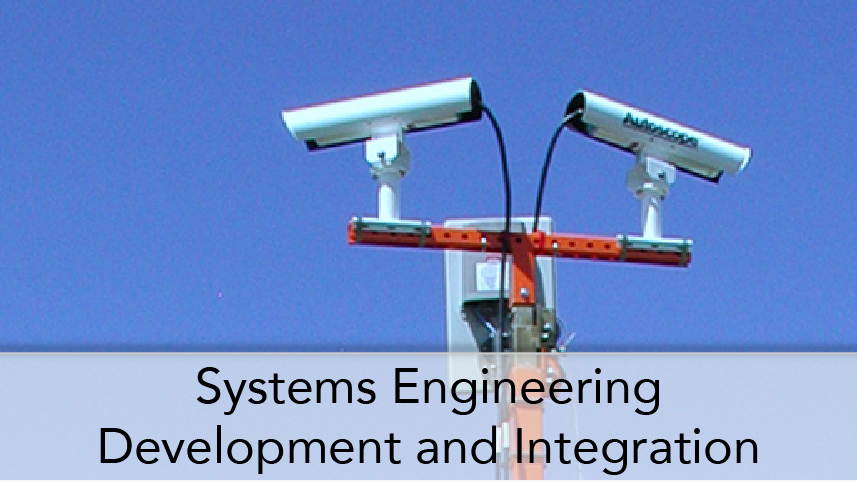 WTI-ProgramThumbTitle-Systems Engineering Development and Integration. Image Subject Cameras and Communications antennas that are part of a standand alone remote communications traffic monitoring trailer.