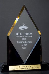 Glass award plaque in glass with the following wording. "Big Sky chamber of Commerce. 2018 Business Person of the Year. David Kack, Western Transportation Institute."