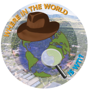 graphic of a hat and magnifying glass over an image of the globe with the text "where in the world is WTI?"