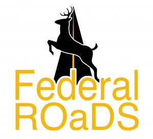 Project logo with graphic image of deer leaping across highway and title Federal ROaDS