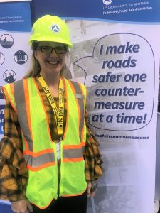 Jaime Sullivan in hard hat and safety vest at NACE 2019 Meeting