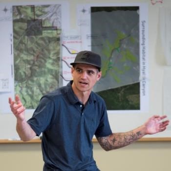 Matthew Bell presents at a wildlife crossings workshop