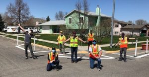 Seven staff members from WTI and City of Bozeman at traffic calming installation in Bozeman, Montana