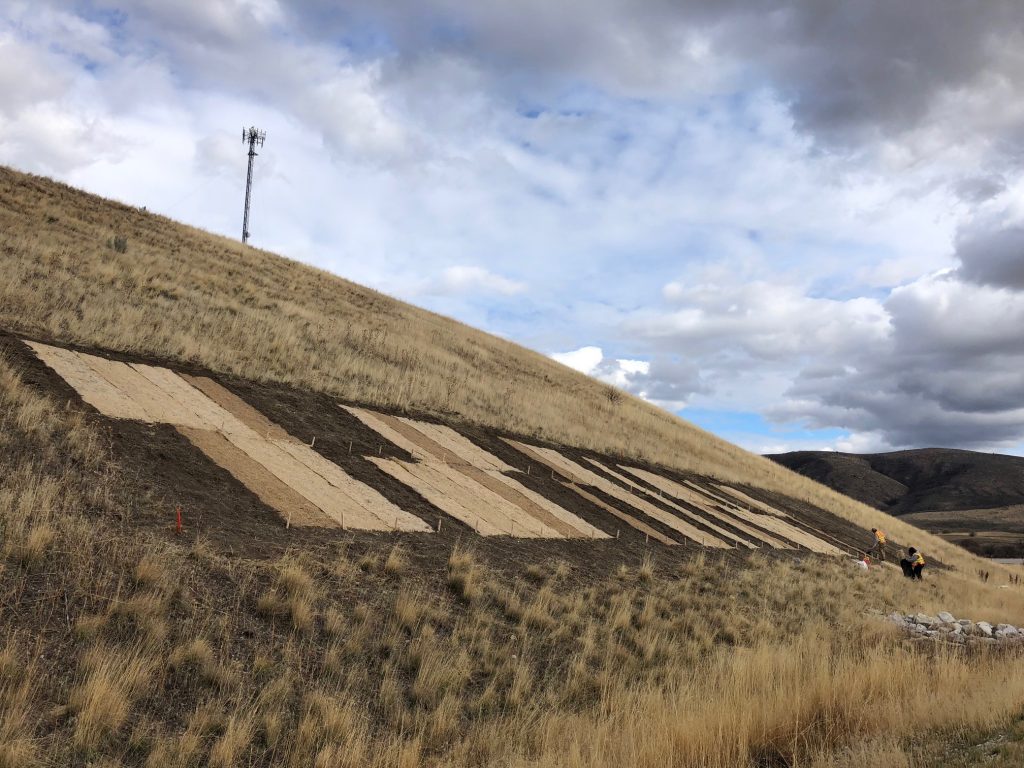 Erosion control blankets installed on hillside in Idaho 2018